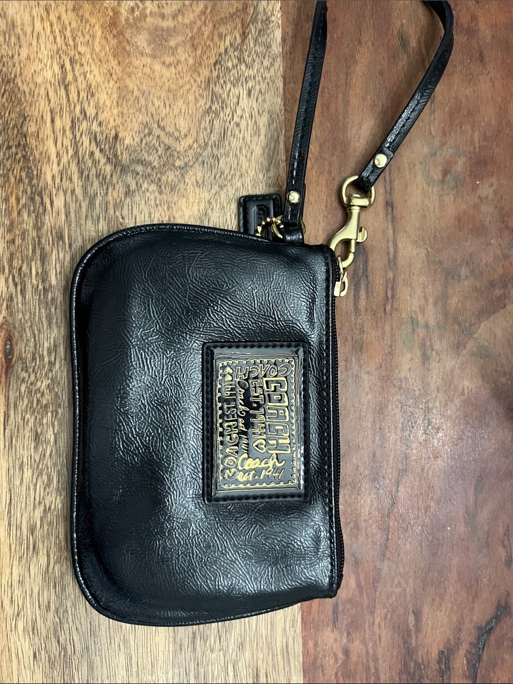 Coach Black Leather Wristlet with Gold Plaque
